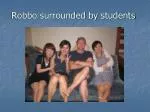 Robbo surrounded by students - slide 1