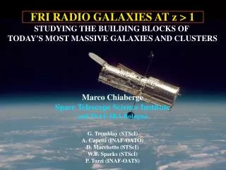 FRI RADIO GALAXIES AT z &gt; 1 STUDYING THE BUILDING BLOCKS OF