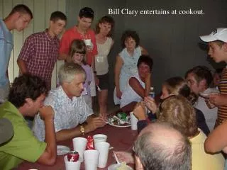 Bill Clary entertains at cookout.