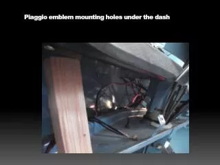 Piaggio emblem mounting holes under the dash