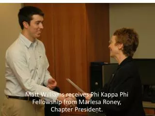 Matt Williams receives Phi Kappa Phi Fellowship from Marlesa Roney, Chapter President.