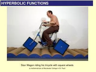 Stan Wagon riding his tricycle with square wheels